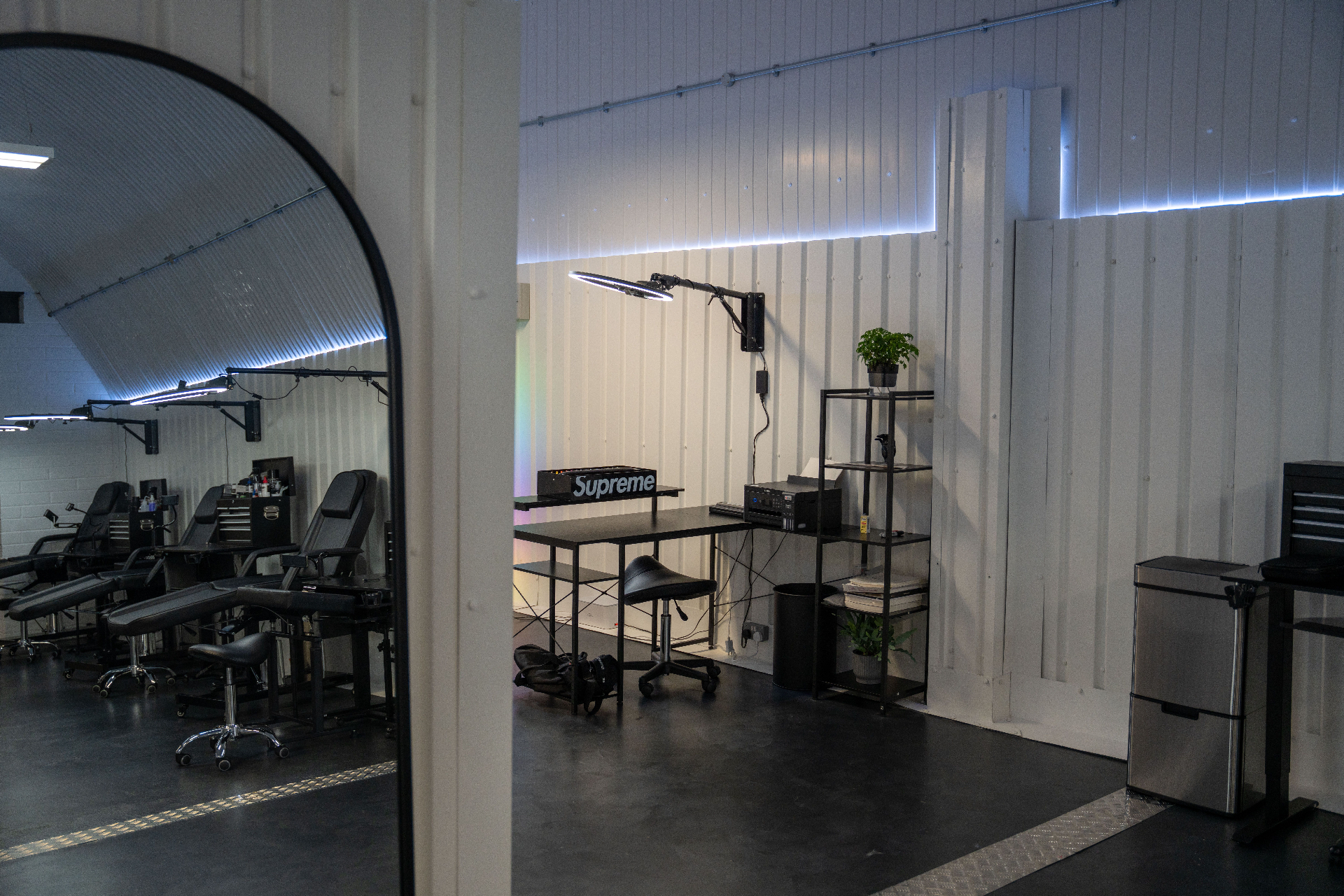 Mirror and private station at the far end of the studio floor