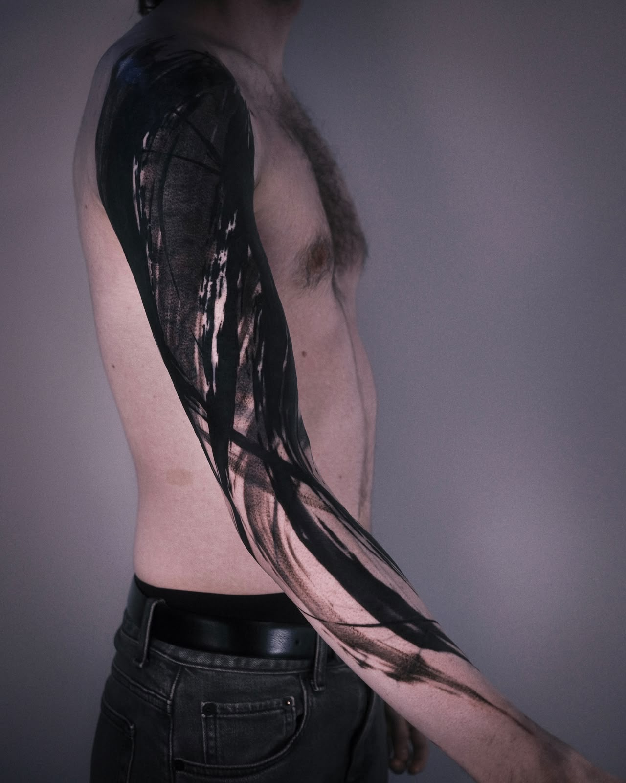 Bold abstract blackwork brushstroke sleeve — London's Glitch