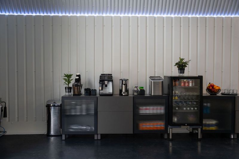 Complimentary coffee and drinks counter for clients in the studio