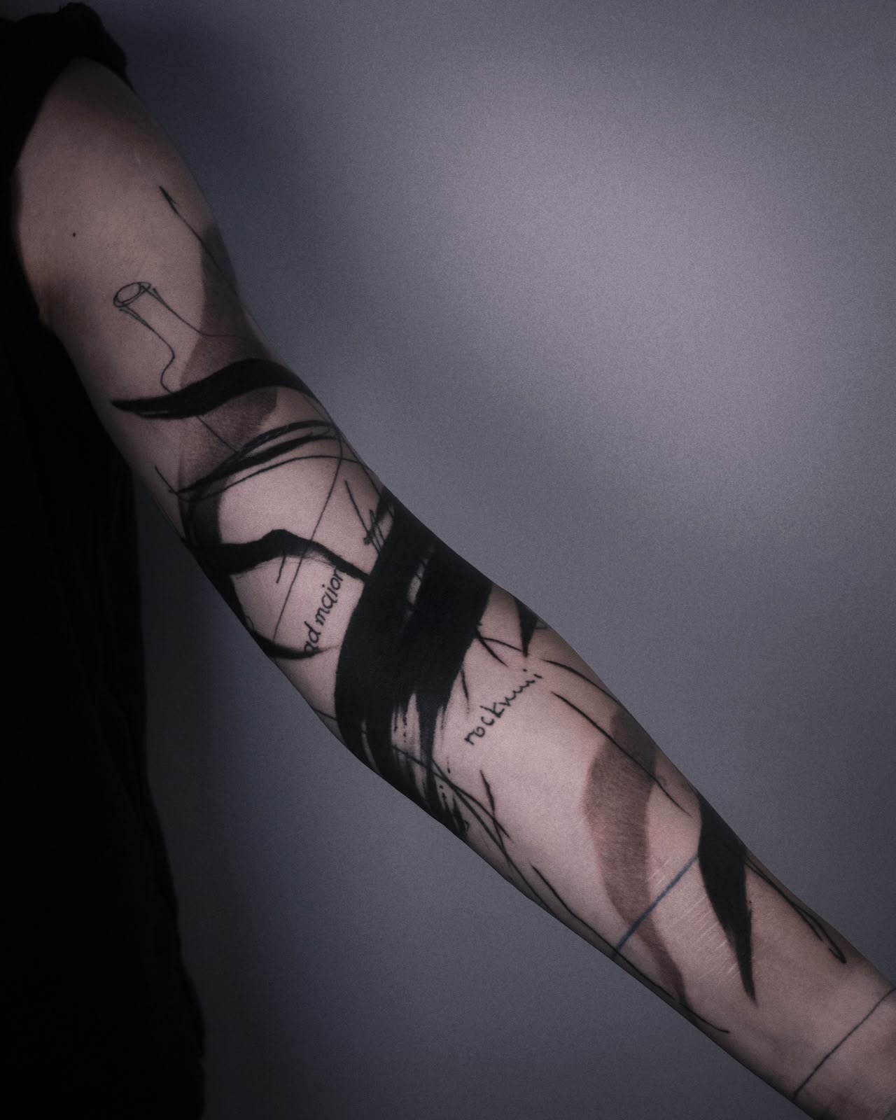 Abstract brushwork sleeve with fine script details — London's Glitch